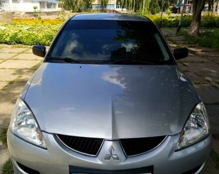 Серый Мицубиси Лансер, объемом двигателя 1.6 л и пробегом 189 тыс. км за 3950 $, фото 9 на Automoto.ua