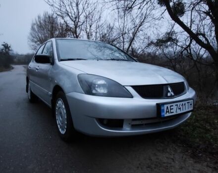 Серый Мицубиси Лансер, объемом двигателя 1.6 л и пробегом 235 тыс. км за 2850 $, фото 18 на Automoto.ua