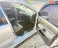 Сірий Міцубісі Lancer, об'ємом двигуна 1.58 л та пробігом 275 тис. км за 2200 $, фото 13 на Automoto.ua
