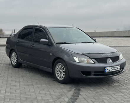 Серый Мицубиси Лансер, объемом двигателя 1.58 л и пробегом 237 тыс. км за 2999 $, фото 6 на Automoto.ua