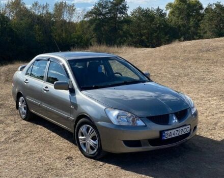 Сірий Міцубісі Lancer, об'ємом двигуна 1.6 л та пробігом 264 тис. км за 5000 $, фото 4 на Automoto.ua