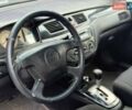 Сірий Міцубісі Lancer, об'ємом двигуна 1.58 л та пробігом 188 тис. км за 3799 $, фото 7 на Automoto.ua