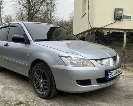 Сірий Міцубісі Lancer, об'ємом двигуна 0.16 л та пробігом 295 тис. км за 4000 $, фото 1 на Automoto.ua