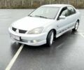 Сірий Міцубісі Lancer, об'ємом двигуна 2 л та пробігом 1 тис. км за 3500 $, фото 2 на Automoto.ua