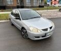 Сірий Міцубісі Lancer, об'ємом двигуна 1.58 л та пробігом 285 тис. км за 2550 $, фото 1 на Automoto.ua