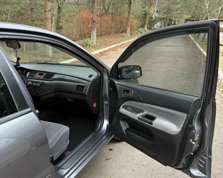 Сірий Міцубісі Lancer, об'ємом двигуна 1.6 л та пробігом 230 тис. км за 2799 $, фото 19 на Automoto.ua