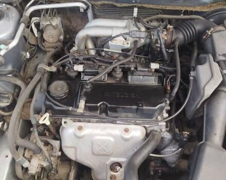 Сірий Міцубісі Lancer, об'ємом двигуна 1.6 л та пробігом 250 тис. км за 4000 $, фото 18 на Automoto.ua
