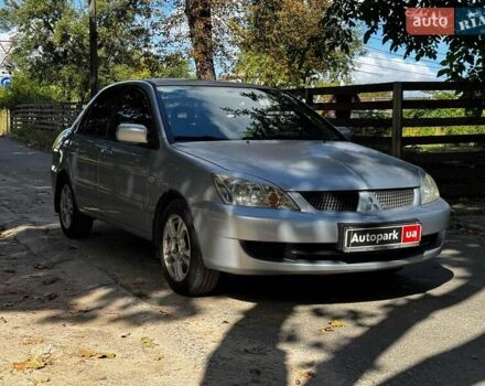 Серый Мицубиси Лансер, объемом двигателя 1.6 л и пробегом 196 тыс. км за 4490 $, фото 3 на Automoto.ua