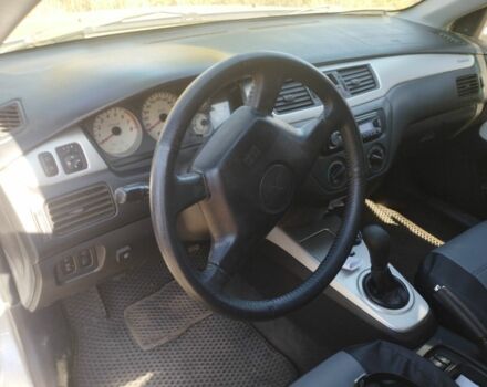 Сірий Міцубісі Lancer, об'ємом двигуна 1.6 л та пробігом 244 тис. км за 3300 $, фото 11 на Automoto.ua