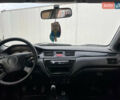 Сірий Міцубісі Lancer, об'ємом двигуна 1.6 л та пробігом 310 тис. км за 3350 $, фото 26 на Automoto.ua
