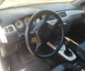 Сірий Міцубісі Lancer, об'ємом двигуна 1.6 л та пробігом 244 тис. км за 3300 $, фото 11 на Automoto.ua