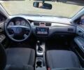 Міцубісі Lancer 2005 у Кам'янське (Дніпродзержинськ) на Automoto.ua Сірий Міцубісі Lancer, об'ємом двигуна 1.6 л та пробігом 220 тис. км за 4100 $, фото 14 на Automoto.ua
