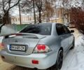 Сірий Міцубісі Lancer, об'ємом двигуна 2 л та пробігом 200 тис. км за 4500 $, фото 1 на Automoto.ua