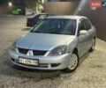 Сірий Міцубісі Lancer, об'ємом двигуна 1.58 л та пробігом 275 тис. км за 2200 $, фото 1 на Automoto.ua