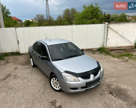 Сірий Міцубісі Lancer, об'ємом двигуна 1.6 л та пробігом 310 тис. км за 3350 $, фото 9 на Automoto.ua