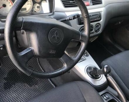 Сірий Міцубісі Lancer, об'ємом двигуна 1.58 л та пробігом 274 тис. км за 4400 $, фото 9 на Automoto.ua