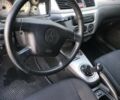 Сірий Міцубісі Lancer, об'ємом двигуна 1.58 л та пробігом 274 тис. км за 4400 $, фото 9 на Automoto.ua