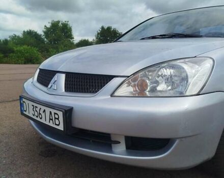 Сірий Міцубісі Lancer, об'ємом двигуна 1.6 л та пробігом 250 тис. км за 4000 $, фото 13 на Automoto.ua