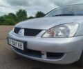 Сірий Міцубісі Lancer, об'ємом двигуна 1.6 л та пробігом 250 тис. км за 4000 $, фото 13 на Automoto.ua