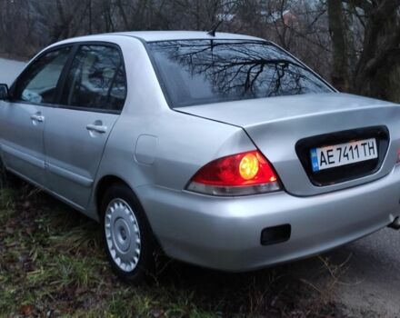 Серый Мицубиси Лансер, объемом двигателя 1.6 л и пробегом 235 тыс. км за 2850 $, фото 4 на Automoto.ua