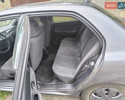 Сірий Міцубісі Lancer, об'ємом двигуна 1.6 л та пробігом 257 тис. км за 3700 $, фото 9 на Automoto.ua