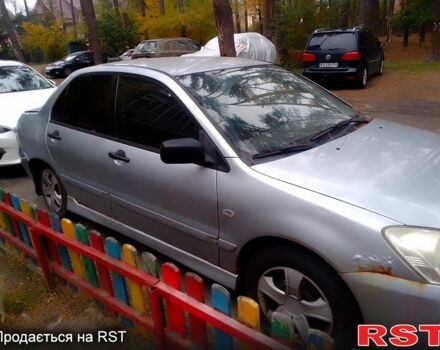 Сірий Міцубісі Lancer, об'ємом двигуна 1.6 л та пробігом 360 тис. км за 1999 $, фото 2 на Automoto.ua