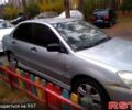 Сірий Міцубісі Lancer, об'ємом двигуна 1.6 л та пробігом 360 тис. км за 1999 $, фото 2 на Automoto.ua