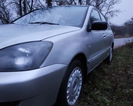 Серый Мицубиси Лансер, объемом двигателя 1.6 л и пробегом 235 тыс. км за 2850 $, фото 22 на Automoto.ua