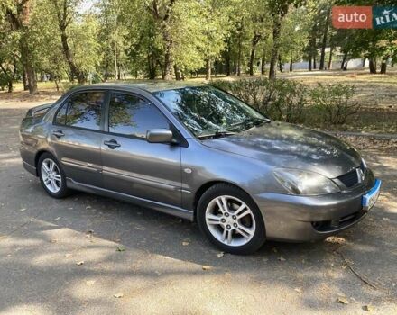 Сірий Міцубісі Lancer, об'ємом двигуна 2 л та пробігом 300 тис. км за 4300 $, фото 11 на Automoto.ua