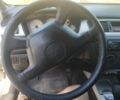 Сірий Міцубісі Lancer, об'ємом двигуна 1.6 л та пробігом 244 тис. км за 3300 $, фото 8 на Automoto.ua