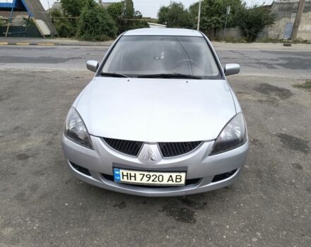 Серый Мицубиси Лансер, объемом двигателя 2 л и пробегом 212 тыс. км за 4300 $, фото 4 на Automoto.ua