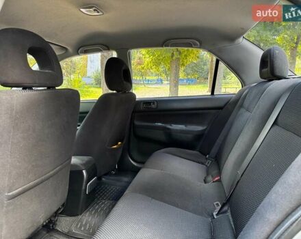 Серый Мицубиси Лансер, объемом двигателя 1.6 л и пробегом 196 тыс. км за 4490 $, фото 21 на Automoto.ua