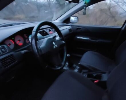 Серый Мицубиси Лансер, объемом двигателя 1.6 л и пробегом 235 тыс. км за 2850 $, фото 12 на Automoto.ua