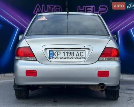 Сірий Міцубісі Lancer, об'ємом двигуна 1.58 л та пробігом 188 тис. км за 3799 $, фото 5 на Automoto.ua