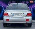 Сірий Міцубісі Lancer, об'ємом двигуна 1.58 л та пробігом 188 тис. км за 3799 $, фото 5 на Automoto.ua