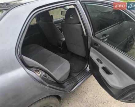 Сірий Міцубісі Lancer, об'ємом двигуна 1.6 л та пробігом 257 тис. км за 3700 $, фото 11 на Automoto.ua
