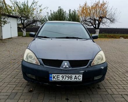 Серый Мицубиси Лансер, объемом двигателя 1.6 л и пробегом 100 тыс. км за 3500 $, фото 1 на Automoto.ua