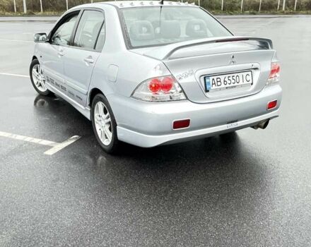 Сірий Міцубісі Lancer, об'ємом двигуна 2 л та пробігом 1 тис. км за 3500 $, фото 4 на Automoto.ua