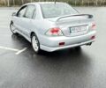 Сірий Міцубісі Lancer, об'ємом двигуна 2 л та пробігом 1 тис. км за 3500 $, фото 4 на Automoto.ua