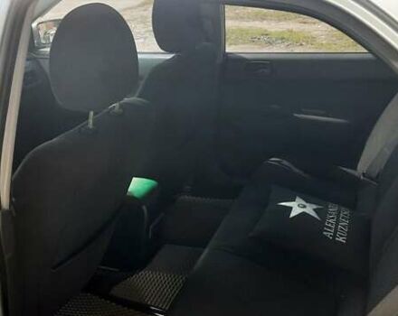 Сірий Міцубісі Lancer, об'ємом двигуна 1.58 л та пробігом 250 тис. км за 5000 $, фото 2 на Automoto.ua