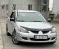 Серый Мицубиси Лансер, объемом двигателя 1.6 л и пробегом 250 тыс. км за 2600 $, фото 1 на Automoto.ua