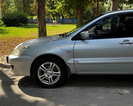 Мицубиси Лансер 2005 в Киеве на Automoto.ua Серый Мицубиси Лансер, объемом двигателя 1.6 л и пробегом 196 тыс. км за 4490 $, фото 10 на Automoto.ua