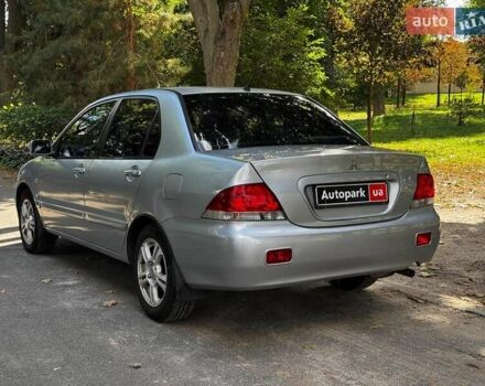 Серый Мицубиси Лансер, объемом двигателя 1.6 л и пробегом 196 тыс. км за 4490 $, фото 8 на Automoto.ua