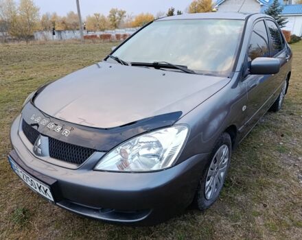 Міцубісі Lancer 2005 у Кам'янське (Дніпродзержинськ) на Automoto.ua Сірий Міцубісі Lancer, об'ємом двигуна 1.6 л та пробігом 220 тис. км за 4100 $, фото 2 на Automoto.ua