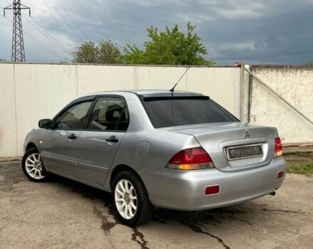 Серый Мицубиси Лансер, объемом двигателя 1.6 л и пробегом 178 тыс. км за 3200 $, фото 2 на Automoto.ua