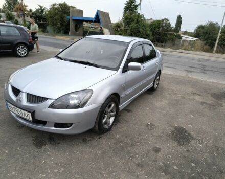 Серый Мицубиси Лансер, объемом двигателя 2 л и пробегом 212 тыс. км за 4300 $, фото 2 на Automoto.ua