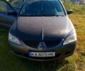 Сірий Міцубісі Lancer, об'ємом двигуна 1.6 л та пробігом 222 тис. км за 3500 $, фото 1 на Automoto.ua