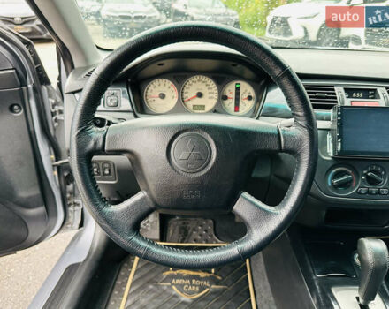 Серый Мицубиси Лансер, объемом двигателя 1.58 л и пробегом 162 тыс. км за 6250 $, фото 25 на Automoto.ua