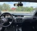 Серый Мицубиси Лансер, объемом двигателя 1.6 л и пробегом 280 тыс. км за 3750 $, фото 21 на Automoto.ua