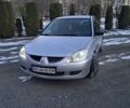 Сірий Міцубісі Lancer, об'ємом двигуна 1.58 л та пробігом 315 тис. км за 3600 $, фото 1 на Automoto.ua
